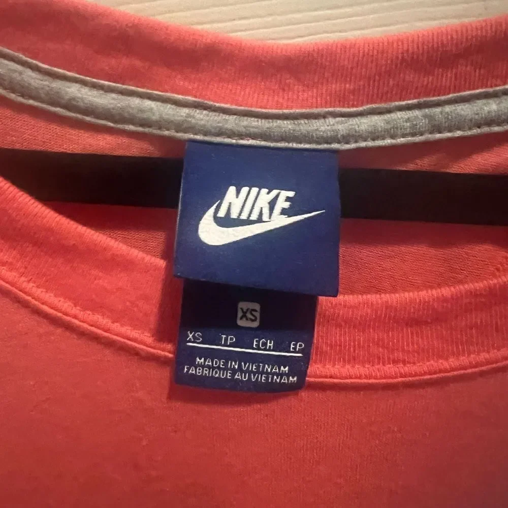 Women's NIKE Racer Back Tank with Large Nike Logo and Swoosh